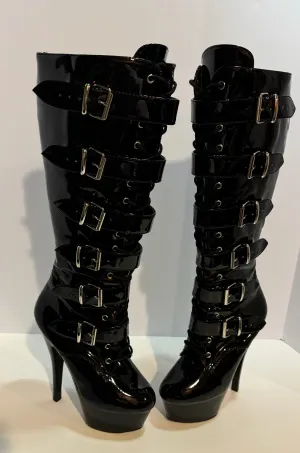 Gorgeous lace up, zipper, buckle, wedge high heel boots .