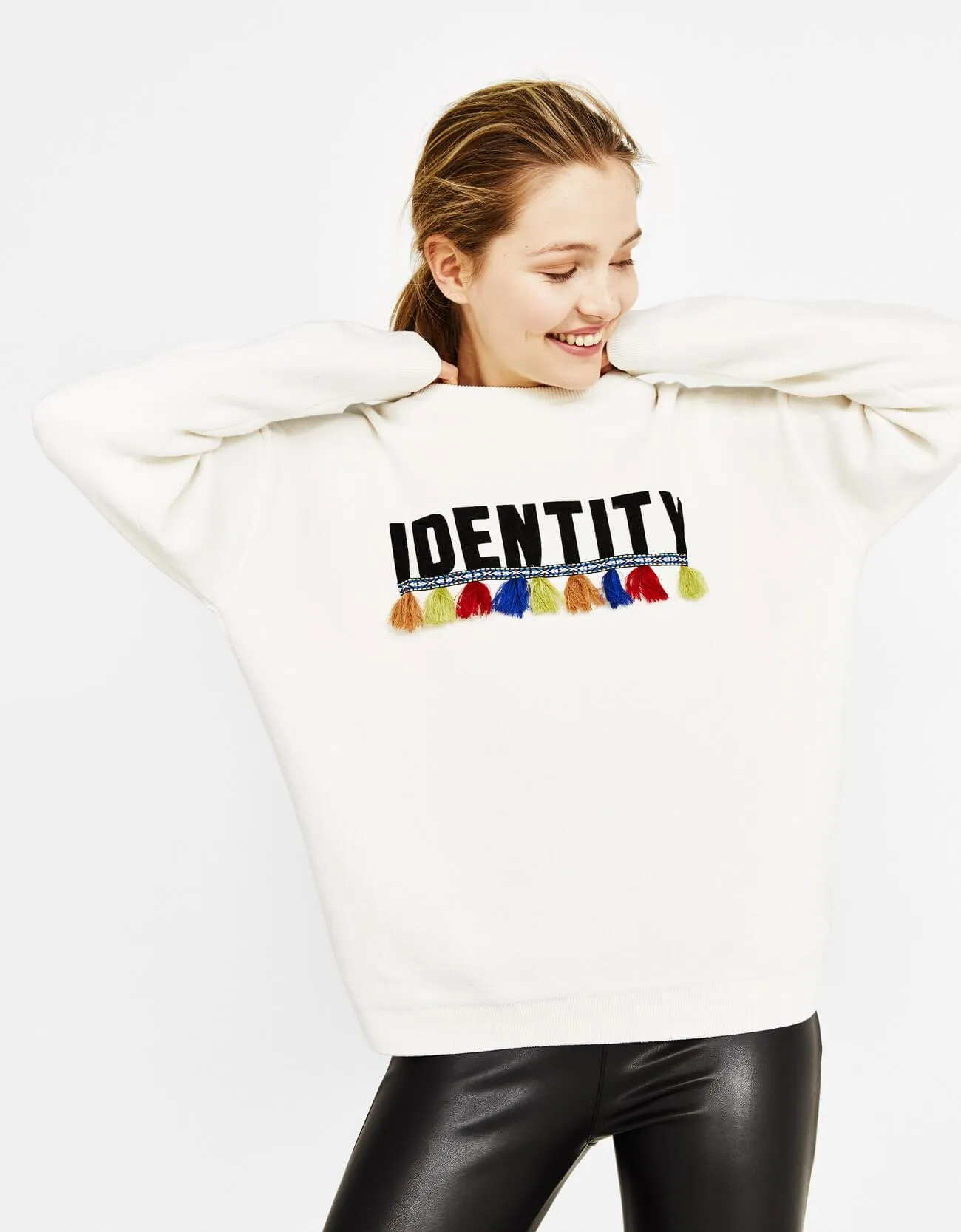 Sweater with slogan